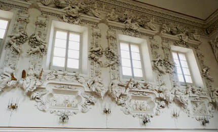 allegorical-statues-on-ledges-with-putti-playing-around-them allegorical-statues-on-ledges-with-putti-playing-around-them